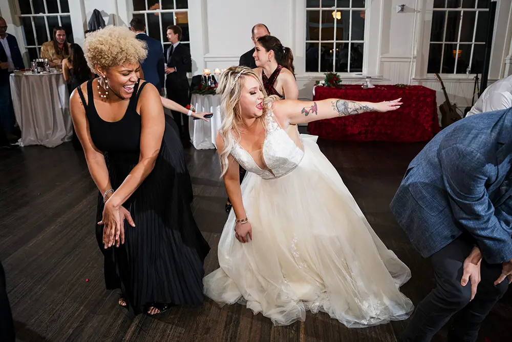Bride dancing with guests